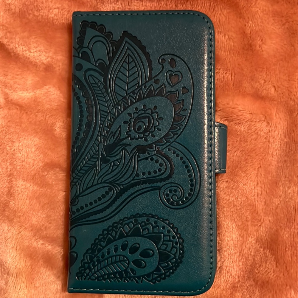 IPhone 7 Plus case magnet cover with credit card holders inside. Just like new.